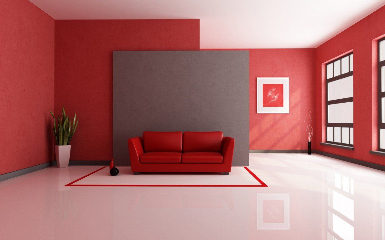 Salon aux murs rouges et canapé présenté sur la page d’accueil de Rennover